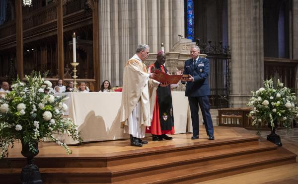 The Rev. Randolph Hollerith, dean of the Washington National Cathedral (from left); the Rev. Carl Wright, the Episcopal Church's bishop suffragan for the armed forces; and Maj. Gen. Steven Schaick, the Air Force chief of chaplains, participate in the bles The Rev. Randolph Hollerith, dean of the Washington National Cathedral (from left); the Rev. Carl Wright, the Episcopal Church's bishop suffragan for the armed forces; and Maj. Gen. Steven Schaick, the Air Force chief of chaplains, participate in the bles