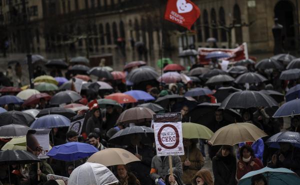 A teenager from the Right to Live Platform (bottom) holds a banner which reads: ''Abortion Zero'' as she takes part in a demonstration in Pamplona, Spain, on March 23, 2014. Spain is awaiting the publication in coming days of a new law banning the intimid A teenager from the Right to Live Platform (bottom) holds a banner which reads: ''Abortion Zero'' as she takes part in a demonstration in Pamplona, Spain, on March 23, 2014. Spain is awaiting the publication in coming days of a new law banning the intimid