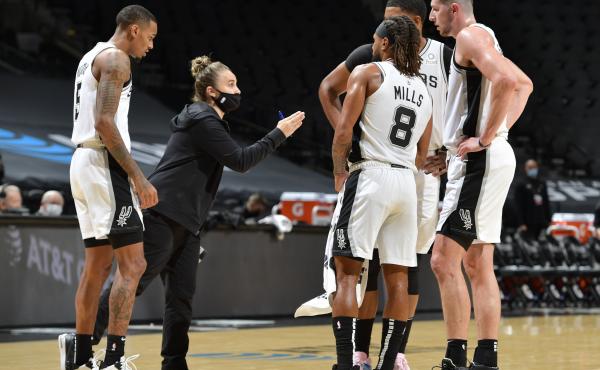 San Antonio Spurs assistant coach Becky Hammon made NBA history Wednesday, becoming the first woman to lead a team in the regular season. She's seen here talking to her players as they faced the Los Angeles Lakers at the AT&T Center in San Antonio. San Antonio Spurs assistant coach Becky Hammon made NBA history Wednesday, becoming the first woman to lead a team in the regular season. She's seen here talking to her players as they faced the Los Angeles Lakers at the AT&T Center in San Antonio.