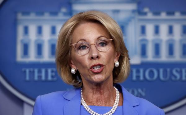 Education Secretary Betsy DeVos speaks to reporters about the coronavirus at the White House in March. Education Secretary Betsy DeVos speaks to reporters about the coronavirus at the White House in March.