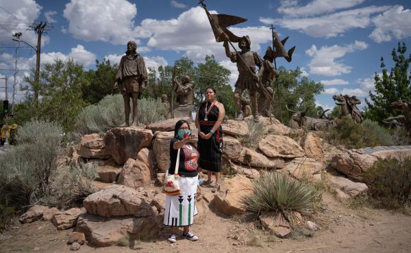 Channing Concho, left, and American Horse photograph themselves in front of a memorial after a sculpture of Spanish conquistador Juan de Onate was removed on June 16, 2020 in Albuquerque. Channing Concho, left, and American Horse photograph themselves in front of a memorial after a sculpture of Spanish conquistador Juan de Onate was removed on June 16, 2020 in Albuquerque.