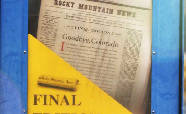 A copy of the final edition of the Rocky Mountain News sits in a newspaper box on a street corner in Denver, Colorado. A copy of the final edition of the Rocky Mountain News sits in a newspaper box on a street corner in Denver, Colorado.