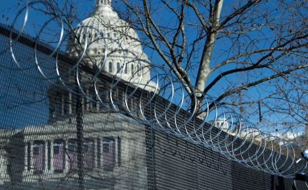 Enhanced security measures, among them razor wire atop a security fence surrounding the U.S. Capitol, are being implemented across the nation in preparation for next week's presidential inauguration. Enhanced security measures, among them razor wire atop a security fence surrounding the U.S. Capitol, are being implemented across the nation in preparation for next week's presidential inauguration.