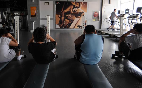 Students exercise at a weight-loss summer camp in China's Shandong Province. The government promotes physical activity as the solution to a growing obesity problem. Students exercise at a weight-loss summer camp in China's Shandong Province. The government promotes physical activity as the solution to a growing obesity problem.