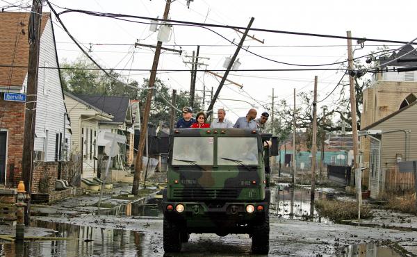 President George W. Bush (center) surveys the devastation in New Orleans with (from left to right) Vice Adm. Thad Allen, Louisiana Gov. Kathleen Blanco, Mayor Ray Nagin and Lt. Gen. Russel Honore on Sept. 12, 2005, two weeks after Hurricane Katrina slamme President George W. Bush (center) surveys the devastation in New Orleans with (from left to right) Vice Adm. Thad Allen, Louisiana Gov. Kathleen Blanco, Mayor Ray Nagin and Lt. Gen. Russel Honore on Sept. 12, 2005, two weeks after Hurricane Katrina slamme