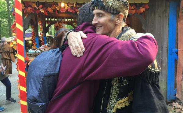 Johnny Fox hugs a fan at the Maryland Renaissance Festival. This fall, Fox has made a triumphant comeback even as he battles with health issues. Johnny Fox hugs a fan at the Maryland Renaissance Festival. This fall, Fox has made a triumphant comeback even as he battles with health issues.