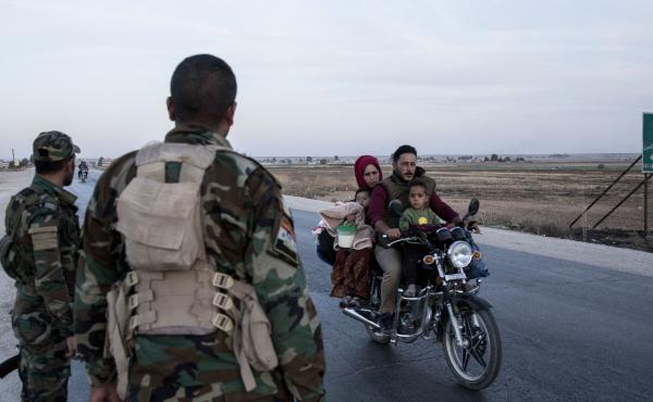 Syrian government troops on Monday moved into towns in northern Syrian formerly controlled by U.S.-backed Kurdish militants. That sets up a potential clash with Turkish forces. Syrian government troops on Monday moved into towns in northern Syrian formerly controlled by U.S.-backed Kurdish militants. That sets up a potential clash with Turkish forces.