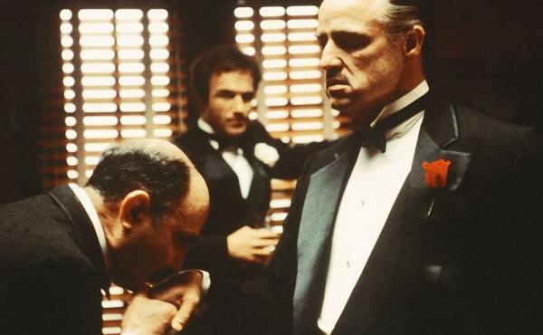 From left to right, Salvatore Corsitto as Bonasera, James Caan as Santino 'Sonny' Corleone and Marlon Brando as Don Vito Corleone in 'The Godfather'. From left to right, Salvatore Corsitto as Bonasera, James Caan as Santino 'Sonny' Corleone and Marlon Brando as Don Vito Corleone in 'The Godfather'.