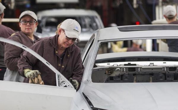 Workers produce vehicles at Volkswagen's U.S. plant in Chattanooga, Tenn. Some 1,600 workers have narrowly voted against unionizing the plant, the second time an effort to unionize the plant has failed in recent years. Workers produce vehicles at Volkswagen's U.S. plant in Chattanooga, Tenn. Some 1,600 workers have narrowly voted against unionizing the plant, the second time an effort to unionize the plant has failed in recent years.