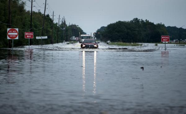 A flooded road leading to the Arkema chemical plant near Houston, Texas in August 2017. Multiple employees including the plant manager are facing criminal charges for allegedly failing to adequately prepare for flooding that caused massive chemical fires A flooded road leading to the Arkema chemical plant near Houston, Texas in August 2017. Multiple employees including the plant manager are facing criminal charges for allegedly failing to adequately prepare for flooding that caused massive chemical fires