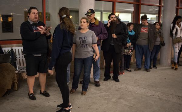 People lined up to vote early at a Houston polling place in October 2018. People lined up to vote early at a Houston polling place in October 2018.