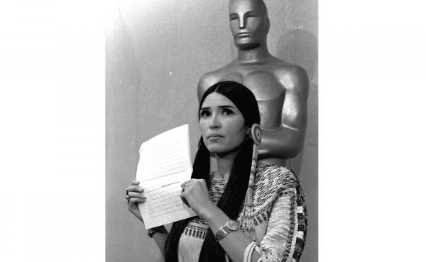 Sacheen Littlefeather appears at the Academy Awards ceremony to announce that Marlon Brando was declining his Oscar as best actor for his role in The Godfather, on March 27, 1973. Sacheen Littlefeather appears at the Academy Awards ceremony to announce that Marlon Brando was declining his Oscar as best actor for his role in The Godfather, on March 27, 1973.