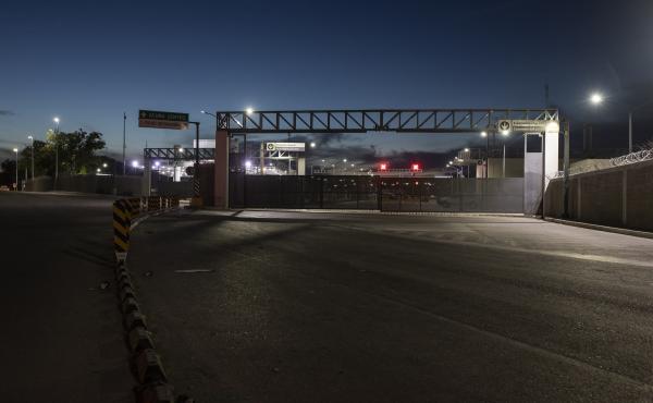 A view of the border bridge in Ciudad Acuna, Mexico, Friday evening, Sept. 24, 2021, across the Rio Grande river from Del Rio, Texas. A view of the border bridge in Ciudad Acuna, Mexico, Friday evening, Sept. 24, 2021, across the Rio Grande river from Del Rio, Texas.