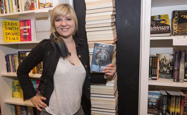 Lani Sarem poses with her novel Handbook for Mortals at the release party for the book in Chicago earlier this month. Lani Sarem poses with her novel Handbook for Mortals at the release party for the book in Chicago earlier this month.