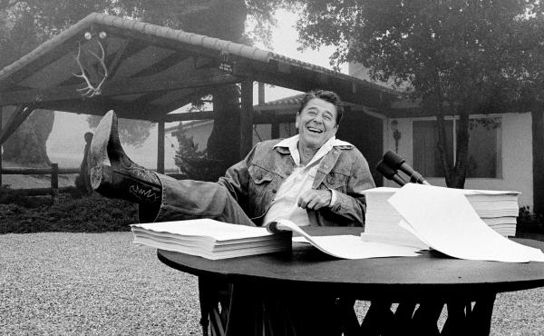 President Ronald Reagan shows his boot following the signing of his tax bill in August 1981 at his vacation home near Santa Barbara, Calif. President Ronald Reagan shows his boot following the signing of his tax bill in August 1981 at his vacation home near Santa Barbara, Calif.