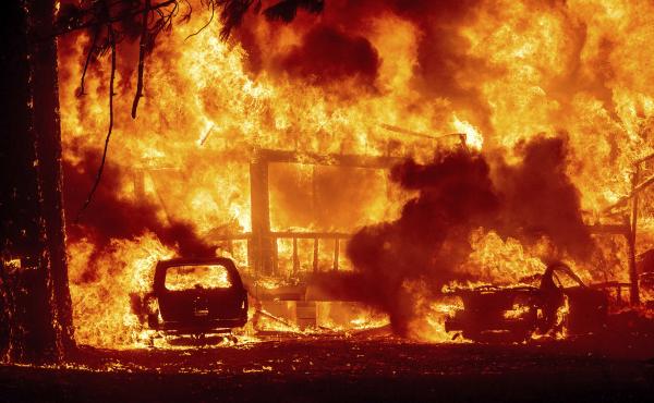 Flames consume a home on Highway 89 as the Dixie Fire tears through the Greenville community of Plumas County, Calif., on Wednesday, Aug. 4, 2021. Flames consume a home on Highway 89 as the Dixie Fire tears through the Greenville community of Plumas County, Calif., on Wednesday, Aug. 4, 2021.