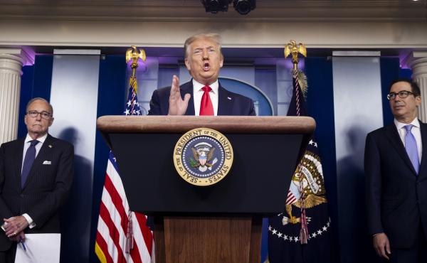 President Trump speaks as Treasury Secretary Steven Mnuchin (right) and Larry Kudlow, director of the National Economic Council, listen during a news briefing on July 2. President Trump speaks as Treasury Secretary Steven Mnuchin (right) and Larry Kudlow, director of the National Economic Council, listen during a news briefing on July 2.