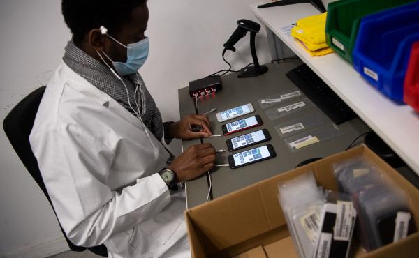 An employee works on smartphones reconditioning in France in January. An employee works on smartphones reconditioning in France in January.