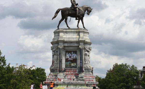 Protesters climb on the base of the statue of Confederate General Robert E. Lee on Monument Avenue on June 6, 2020 in Richmond, Virginia amid continued protests over the death of George Floyd in police custody. The statue is set to be taken down on Sept. Protesters climb on the base of the statue of Confederate General Robert E. Lee on Monument Avenue on June 6, 2020 in Richmond, Virginia amid continued protests over the death of George Floyd in police custody. The statue is set to be taken down on Sept.