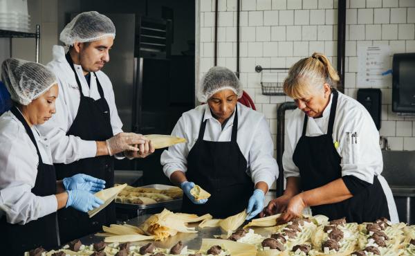 From left: Gloria Amaya, José Amaya, Silvia Gómez, and Alicia Villanueva, the founder of Tamales Los Mayas. A graduate of La Cocina's program for food entrepreneurs, Villanueva now provides catering to scores of Bay Area companies each month, and her ta From left: Gloria Amaya, José Amaya, Silvia Gómez, and Alicia Villanueva, the founder of Tamales Los Mayas. A graduate of La Cocina's program for food entrepreneurs, Villanueva now provides catering to scores of Bay Area companies each month, and her ta
