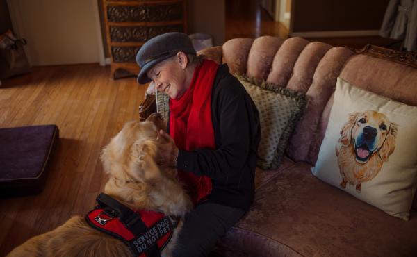 Peggy Gibson sits in her living room with her service dog, Rocky, in West Jefferson, N.C., last November. Gibson says Rocky, a diabetic alert dog, isn't able to work well in public. Peggy Gibson sits in her living room with her service dog, Rocky, in West Jefferson, N.C., last November. Gibson says Rocky, a diabetic alert dog, isn't able to work well in public.