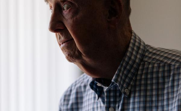 Chuck Lowry, shown at home last month in Santa Ana, Calif., says hiring ramped up so quickly that they ran out of equipment: "I know people that took doors off of the offices and put them on sawhorses and that became their drafting table." Chuck Lowry, shown at home last month in Santa Ana, Calif., says hiring ramped up so quickly that they ran out of equipment: "I know people that took doors off of the offices and put them on sawhorses and that became their drafting table."