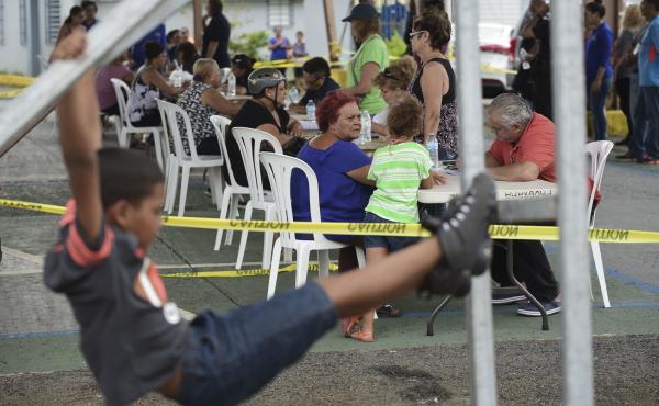 In the aftermath of Hurricane Maria, residents meet with FEMA representatives to file forms for federal aid at the Jose de Diego Elementary School in Las Piedras, Puerto Rico, on Oct. 2. In the aftermath of Hurricane Maria, residents meet with FEMA representatives to file forms for federal aid at the Jose de Diego Elementary School in Las Piedras, Puerto Rico, on Oct. 2.
