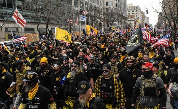 Members of the Proud Boys march toward Freedom Plaza during a protest in December 2020 in Washington, D.C. The Proud Boys has been designated as a hate group by the Southern Poverty Law Center. Members of the Proud Boys march toward Freedom Plaza during a protest in December 2020 in Washington, D.C. The Proud Boys has been designated as a hate group by the Southern Poverty Law Center.