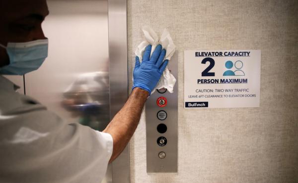 Elevator safety measures that take COVID-19 into account are posted at Cambridge Discovery Park, a life sciences office development in Cambridge, Mass. Elevator safety measures that take COVID-19 into account are posted at Cambridge Discovery Park, a life sciences office development in Cambridge, Mass.