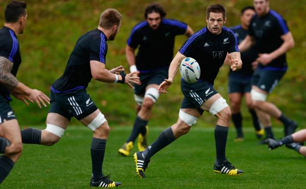 Richie McCaw of the All Blacks passes during a New Zealand training session on Friday in preparation for the World Cup final on Saturday. Richie McCaw of the All Blacks passes during a New Zealand training session on Friday in preparation for the World Cup final on Saturday.