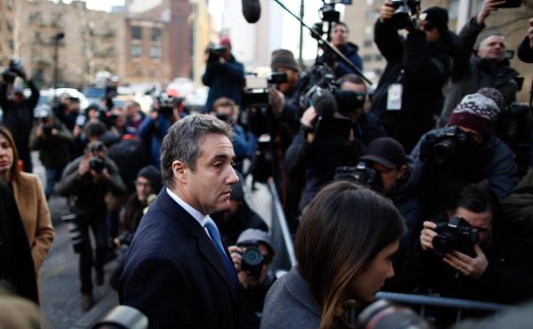 Michael Cohen, President Trump's former personal attorney, arrives at federal court for his sentencing hearing on Wednesday in New York City. He was sentenced to three years in prison. Michael Cohen, President Trump's former personal attorney, arrives at federal court for his sentencing hearing on Wednesday in New York City. He was sentenced to three years in prison.
