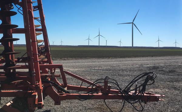 Wind turbines and farm equipment now dot Horace Pritchard's land, where he raises corn, soybeans, and other crops. He also receives payments for hosting nine of the more than 100 wind turbines now operating near Elizabeth City, N.C. Wind turbines and farm equipment now dot Horace Pritchard's land, where he raises corn, soybeans, and other crops. He also receives payments for hosting nine of the more than 100 wind turbines now operating near Elizabeth City, N.C.