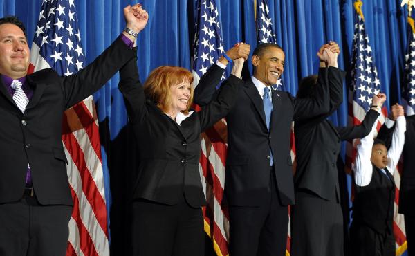 President Barack Obama celebrates with lawmakers after signing into law the Patient Protection and Affordable Care Act health insurance bill in March 2010. President Barack Obama celebrates with lawmakers after signing into law the Patient Protection and Affordable Care Act health insurance bill in March 2010.