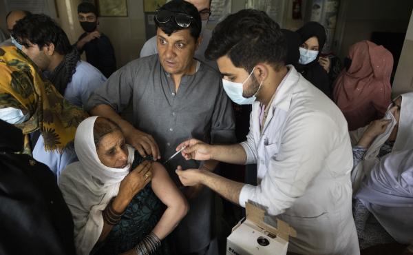 Doctors administer the Johnson & Johnson COVID-19 vaccine to patients at the Wazir Akbar Khan hospital in Kabul, Afghanistan in July. Doctors administer the Johnson & Johnson COVID-19 vaccine to patients at the Wazir Akbar Khan hospital in Kabul, Afghanistan in July.