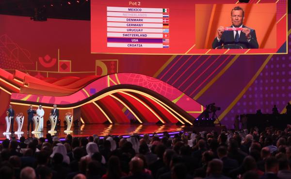 Lothar Matthaus draws the card of USA in Group B during the FIFA World Cup Qatar 2022 Final Draw on Friday in Doha, Qatar. Lothar Matthaus draws the card of USA in Group B during the FIFA World Cup Qatar 2022 Final Draw on Friday in Doha, Qatar.
