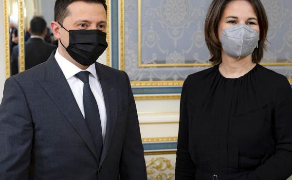 In this photo provided by Ukrainian Presidential Press Office, Ukrainian President Volodymyr Zelenskyy, left, and German Foreign Minister Annalena Baerbock pose for a photo during their meeting in Kyiv, Ukraine, Monday, Jan. 17, 2022. In this photo provided by Ukrainian Presidential Press Office, Ukrainian President Volodymyr Zelenskyy, left, and German Foreign Minister Annalena Baerbock pose for a photo during their meeting in Kyiv, Ukraine, Monday, Jan. 17, 2022.