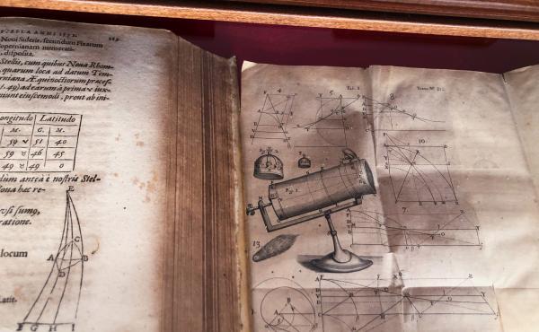 Astronomical text books in Latin are displayed at the Vatican Observatory. Astronomical text books in Latin are displayed at the Vatican Observatory.