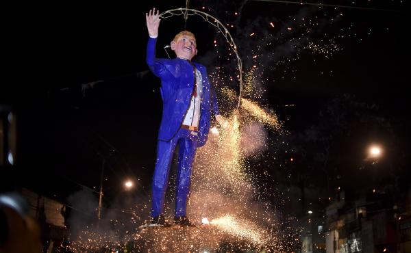 Mexicans set fire to an effigy of Donald Trump during Holy Week celebrations in Mexico City on March 26. Mexicans set fire to an effigy of Donald Trump during Holy Week celebrations in Mexico City on March 26.
