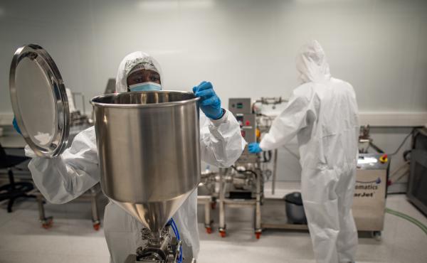 Members of a team at the Afrigen Biologics and Vaccines lab in Cape Town, South Africa. The World Health Organization has enlisted the company to replicate Moderna's COVID-19 vaccine. Members of a team at the Afrigen Biologics and Vaccines lab in Cape Town, South Africa. The World Health Organization has enlisted the company to replicate Moderna's COVID-19 vaccine.