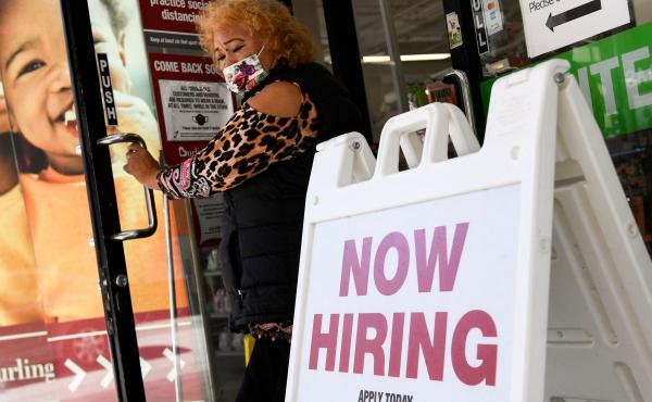 A 'now hiring' sign is displayed outside of a Burlington Coat Factory retail store in downtown Los Angeles on March 11. A 'now hiring' sign is displayed outside of a Burlington Coat Factory retail store in downtown Los Angeles on March 11.
