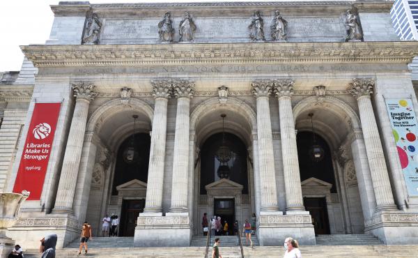 People walk along the stairs of the New York Public Library on July 06, 2021 in Midtown Manhattan in New York City. People walk along the stairs of the New York Public Library on July 06, 2021 in Midtown Manhattan in New York City.