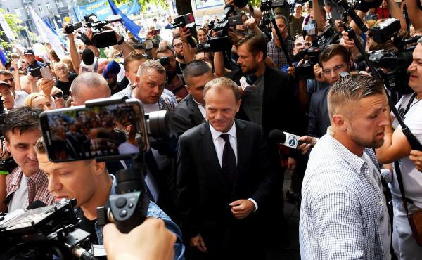 Donald Tusk, president of the European Council and a former Polish prime minister, arrives at the prosecutor's office in Warsaw to deliver testimony Thursday on the 2010 plane crash that killed President Lech Kaczynski. Donald Tusk, president of the European Council and a former Polish prime minister, arrives at the prosecutor's office in Warsaw to deliver testimony Thursday on the 2010 plane crash that killed President Lech Kaczynski.