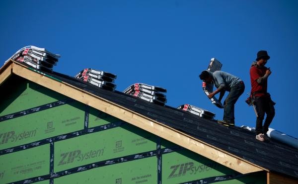 Contractors work on the roof of a house under construction in Louisville, Ky. A new study shows the U.S. is 3.8 million homes short of meeting housing needs. Contractors work on the roof of a house under construction in Louisville, Ky. A new study shows the U.S. is 3.8 million homes short of meeting housing needs.