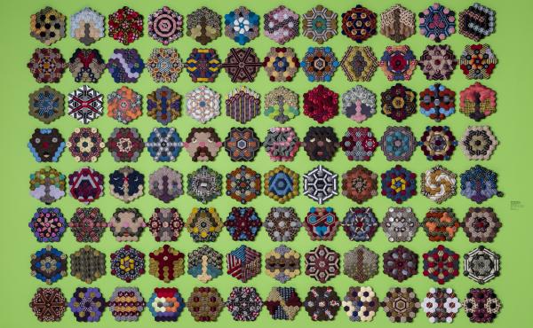 Each of these vignettes required 37 "hexies," little hexagonal scraps cut from donated neckties. Each of these vignettes required 37 "hexies," little hexagonal scraps cut from donated neckties.