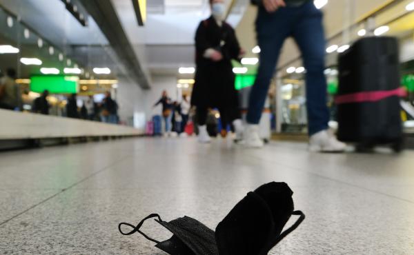 A mask is seen on the ground at John F. Kennedy Airport in New York City. On Monday, a federal judge in Florida struck down the mask mandate for airports and other methods of public transportation as a new COVID variant is on the rise across parts of the A mask is seen on the ground at John F. Kennedy Airport in New York City. On Monday, a federal judge in Florida struck down the mask mandate for airports and other methods of public transportation as a new COVID variant is on the rise across parts of the