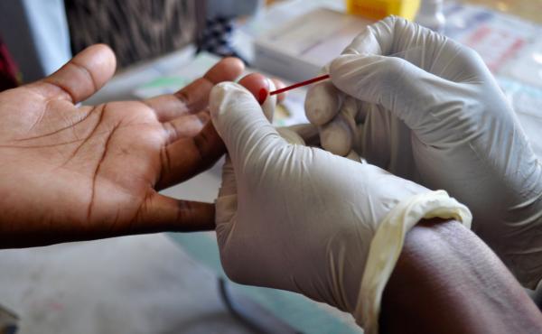 Drawing blood to test for HIV. Drawing blood to test for HIV.