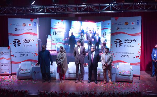 Pakistan's four Integrity Icon honorees and one stand-in: from left to right, Imran Zia, Rohana Kakar, Umar Tufail's cousin Mohammad Saleh (Tufail couldn't attend as he was stuck in the field working), Rizwan Alam Sherwani and Zahid Ali Khan Khattak. Pakistan's four Integrity Icon honorees and one stand-in: from left to right, Imran Zia, Rohana Kakar, Umar Tufail's cousin Mohammad Saleh (Tufail couldn't attend as he was stuck in the field working), Rizwan Alam Sherwani and Zahid Ali Khan Khattak.