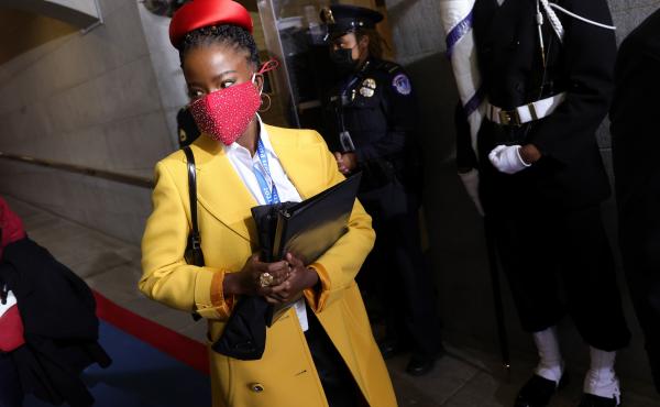 Former National Youth Poet Laureate Amanda Gorman arrives at the inauguration of US President-elect Joe Biden on the West Front of the US Capitol on Jan. 20 in Washington, D.C. Gorman says she was tailed Friday night by a security guard who said she looke Former National Youth Poet Laureate Amanda Gorman arrives at the inauguration of US President-elect Joe Biden on the West Front of the US Capitol on Jan. 20 in Washington, D.C. Gorman says she was tailed Friday night by a security guard who said she looke