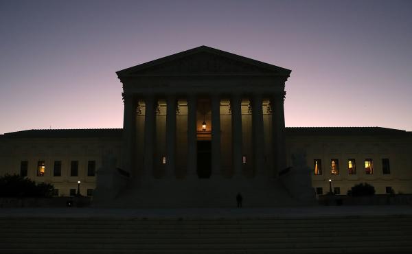 The sun begins to rise behind the U.S. Supreme Court on Monday, the first day of the high court's new session. The sun begins to rise behind the U.S. Supreme Court on Monday, the first day of the high court's new session.