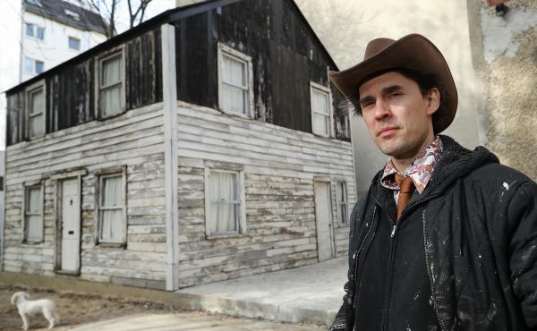 U.S. artist Ryan Mendoza poses for a photo next to the former house of Afro-American human rights figure Rosa Parks on Mendoza's property on April 6, 2017 in Berlin, Germany. Mendoza bought the house, which was slated for demolition in Detroit, took it ap U.S. artist Ryan Mendoza poses for a photo next to the former house of Afro-American human rights figure Rosa Parks on Mendoza's property on April 6, 2017 in Berlin, Germany. Mendoza bought the house, which was slated for demolition in Detroit, took it ap